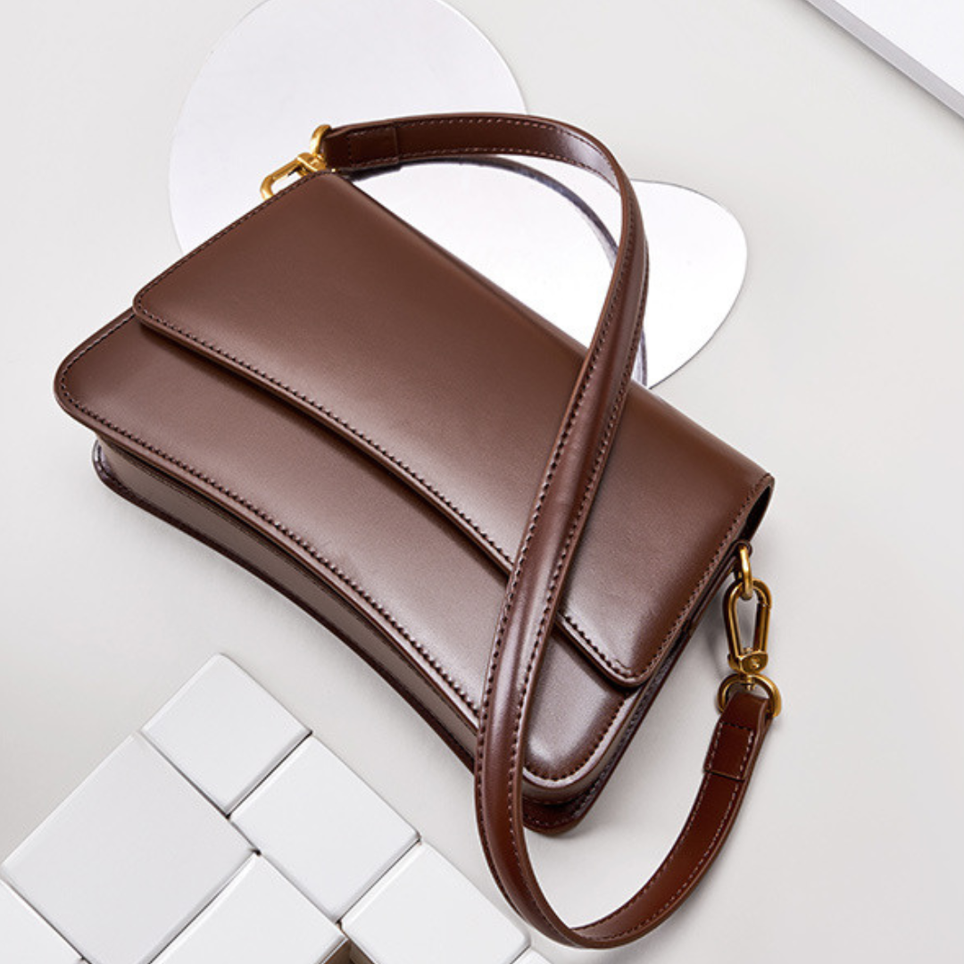 <tc>Britney Sleek Leder Umhängetasche</tc>