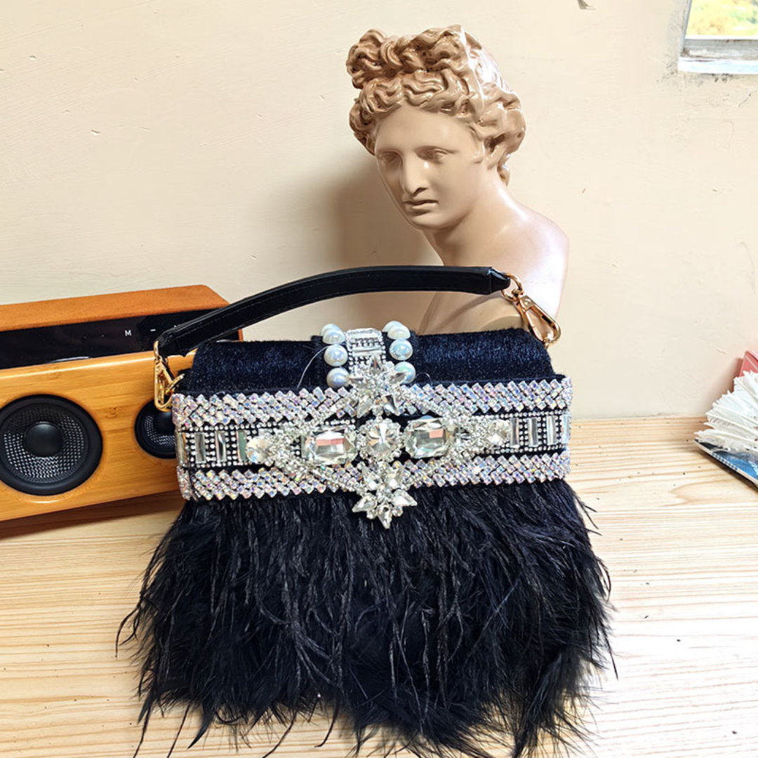 <tc>Velora Federtasche</tc>
