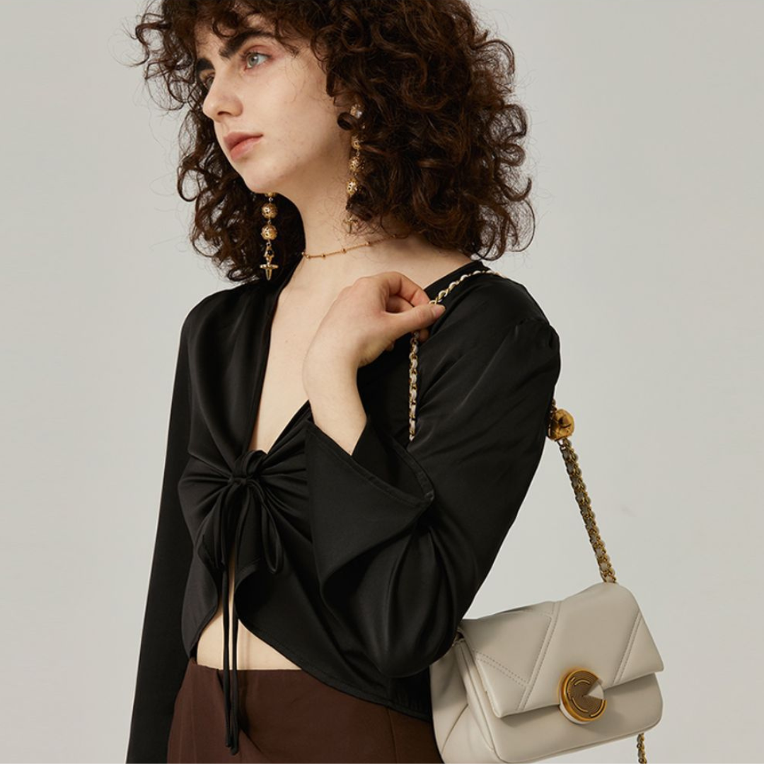 <tc>Alina Orbit Crossbody Tasche</tc>