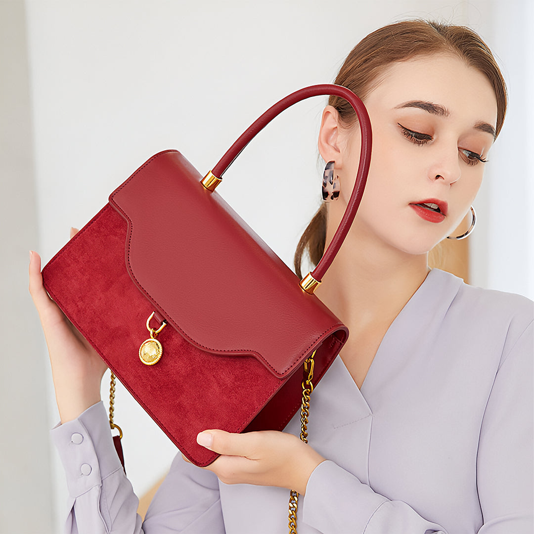 Regal Charm Suede Handbag