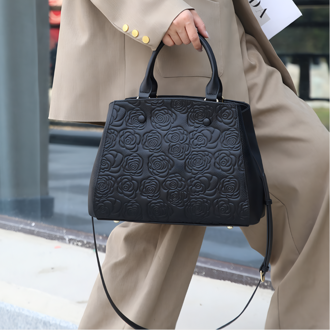 <tc>Stacy Handtasche mit Blumenprägung</tc>