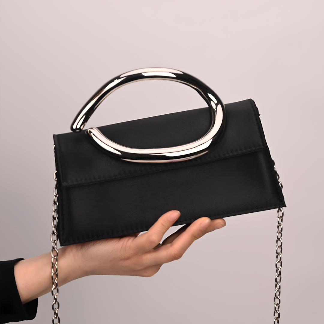 <tc>Liz Clutch mit geformtem Griff</tc>