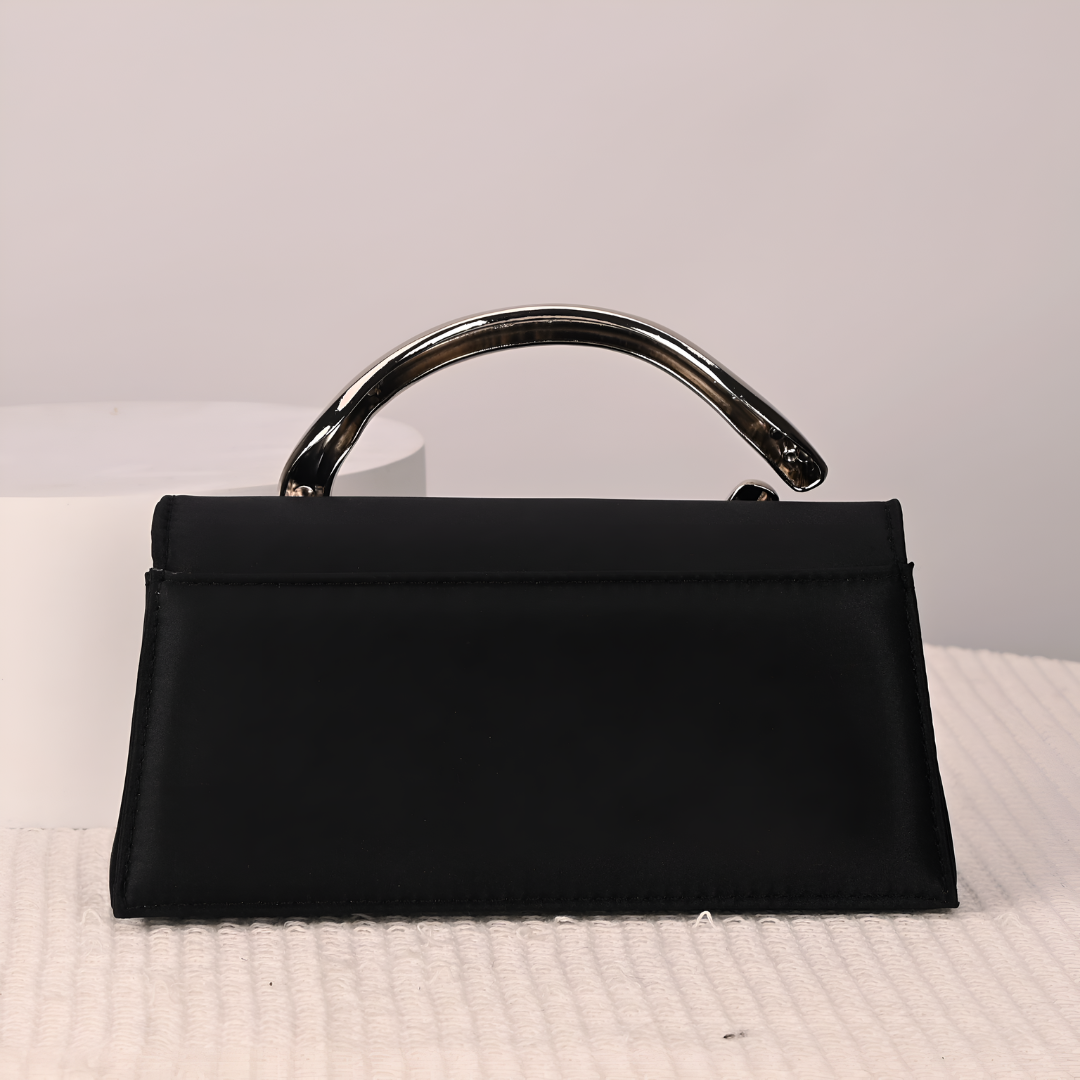<tc>Liz Clutch mit geformtem Griff</tc>
