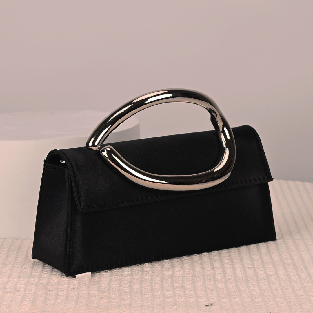 <tc>Liz Clutch mit geformtem Griff</tc>