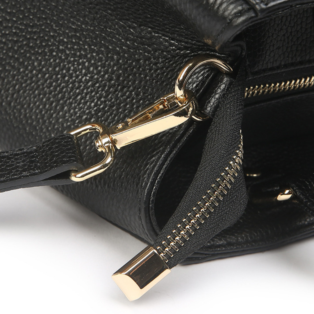 <tc>Stacy Handtasche mit Blumenprägung</tc>