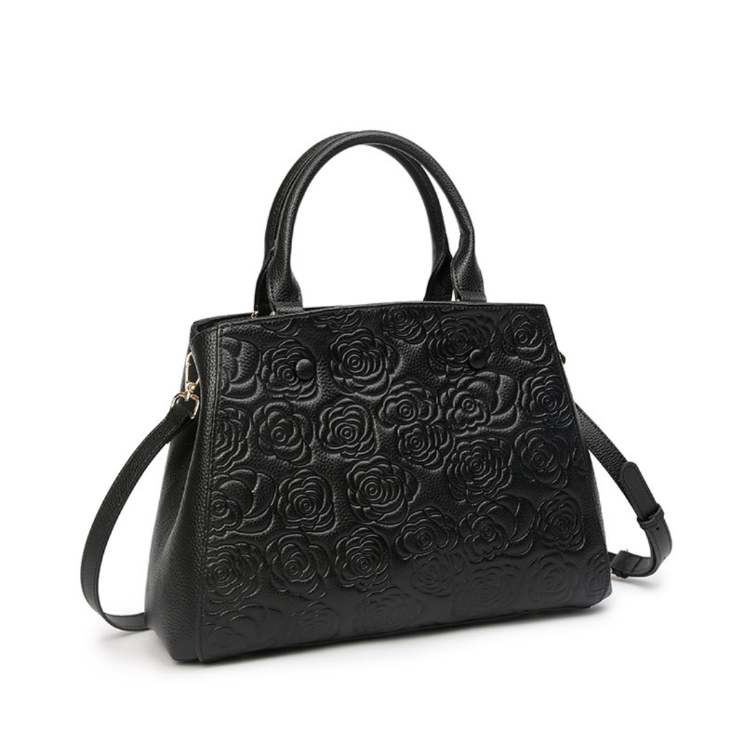 <tc>Stacy Handtasche mit Blumenprägung</tc>